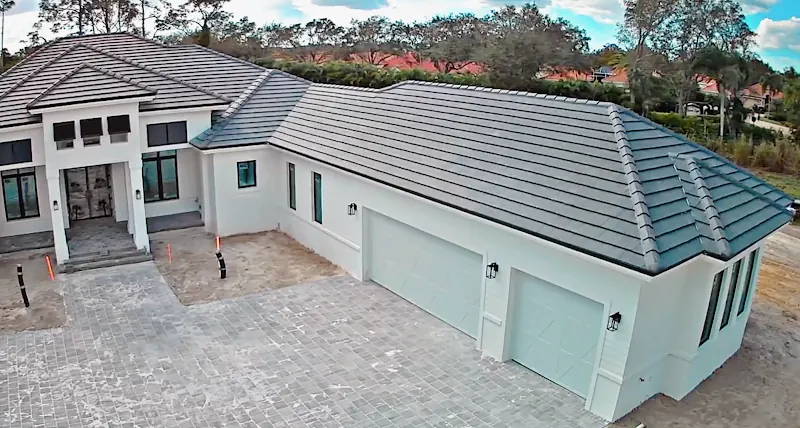 Aerial view of a gray tile roof on a single-story home, Big River Roofing